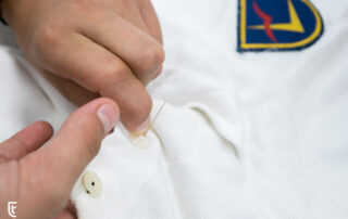 Cómo aprender a coser un botón en el colegio